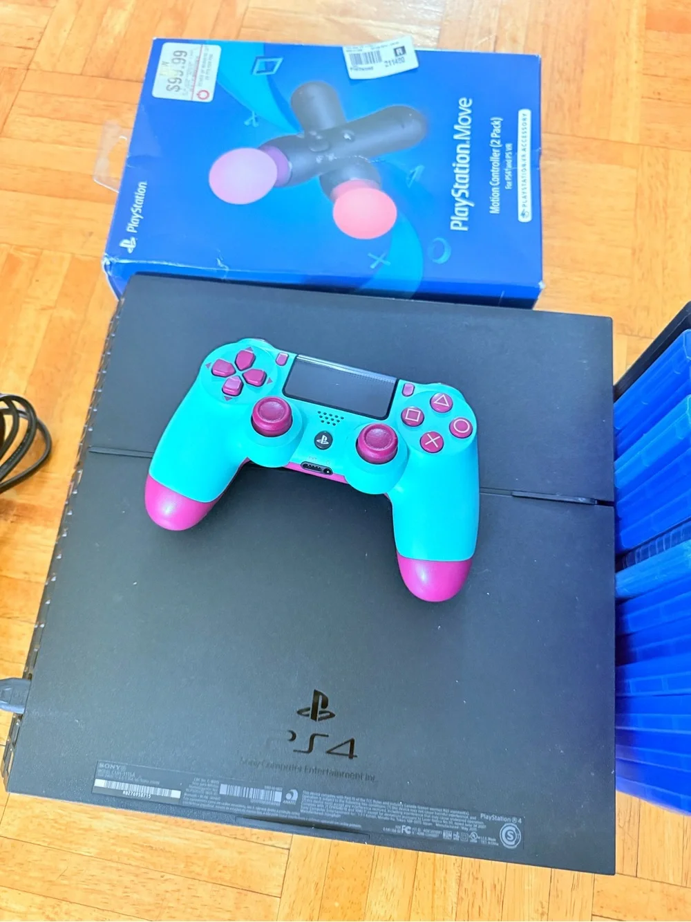 Sony PS4 Console with Turquoise & Pink DualShock Controller and Game Bundle